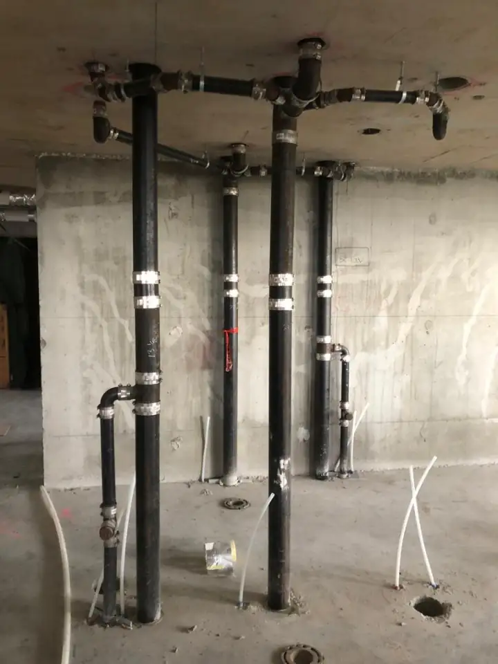 Commercial mechanical crew at active construction site in Vancouver